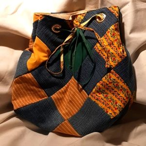 Handmade designer drawstring crossbody bag